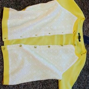 A yellow and white tommy Hilfiger sweater shirt